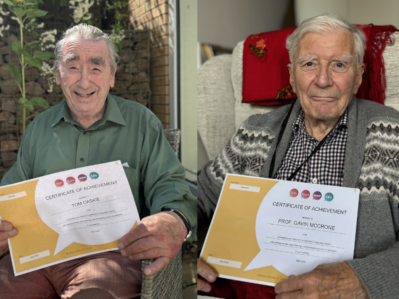 Two care home residents present their certificates for National 2 qualification in (Italian) languages